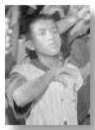 Baby Willie as a schoolboy giving national salute, circa 1962.